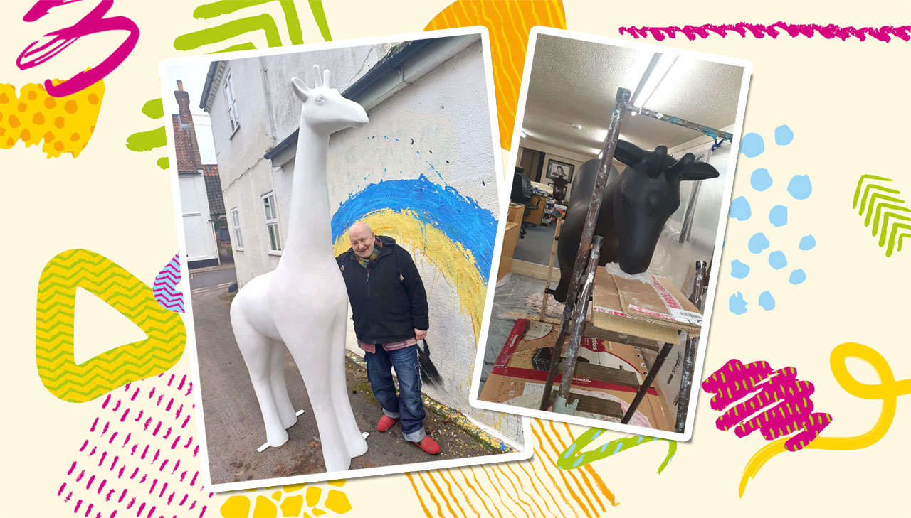 A photo of Phil Daniels and a GoGoSafari Giraffe sculpture